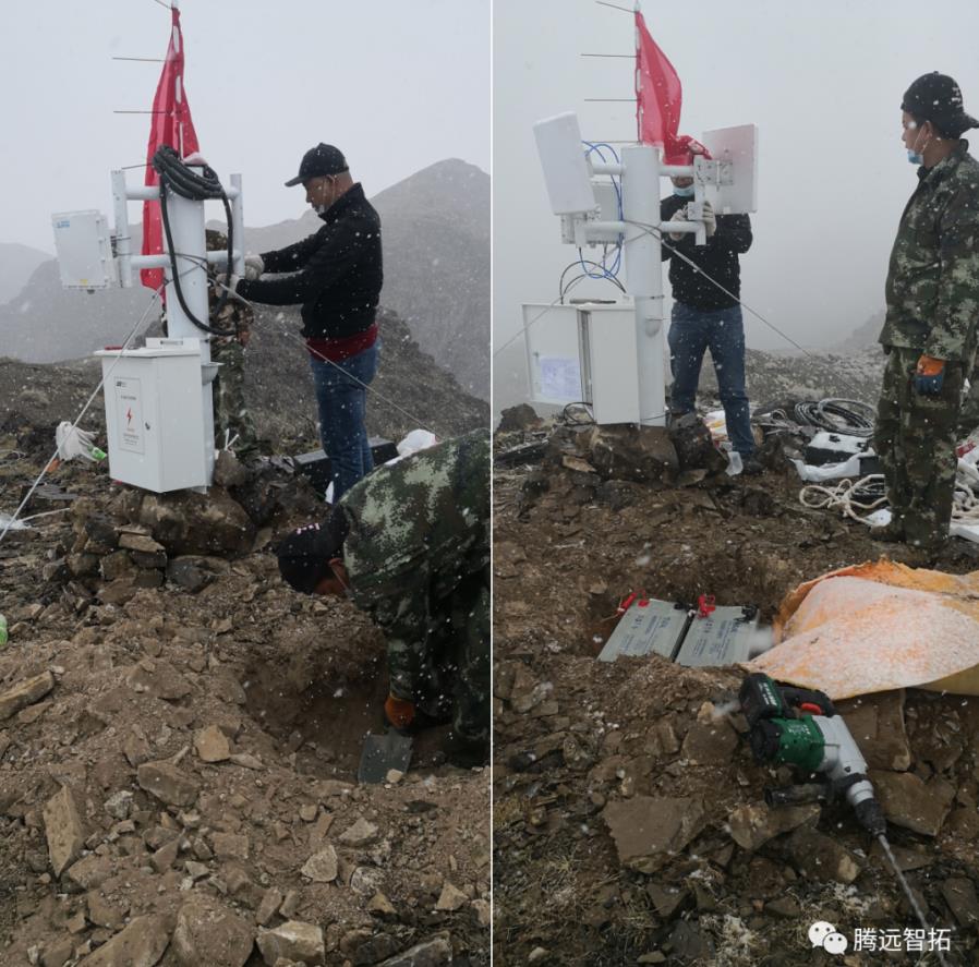 工作人員在山頂緊張安裝中
